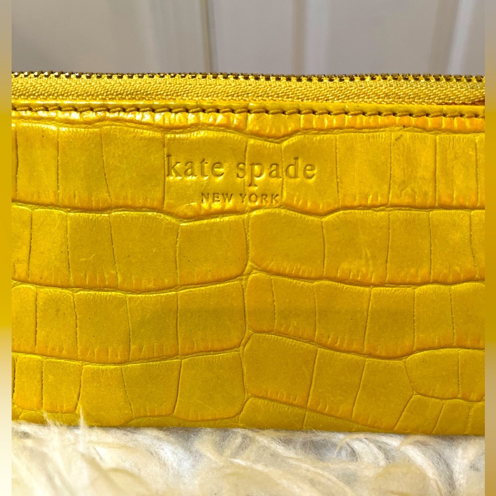 Kate Spade Embossed Baguette Yellow long leather zipped wristlet. Unique